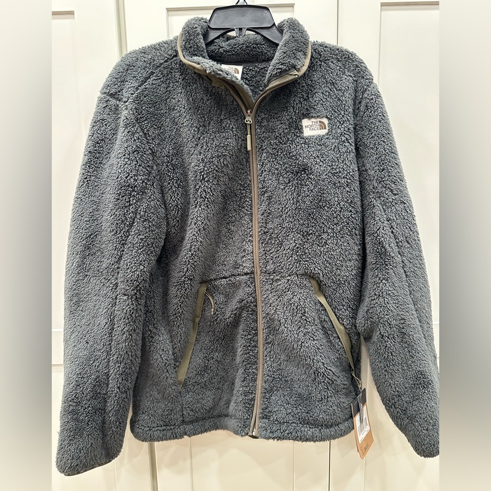 Charcoal grey (darker than the photos show) NorthFace jacket